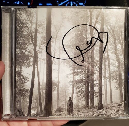 signed-taylor-swift-folklore-cd-in-hand-auto-jsa-certified