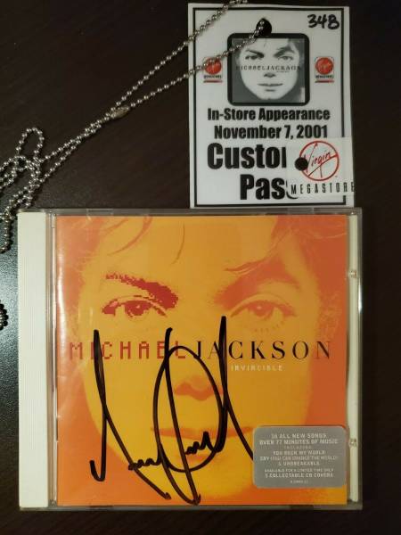 Michael Jackson Invincible autographed CD   VIP pass Virgin Megastore 2001