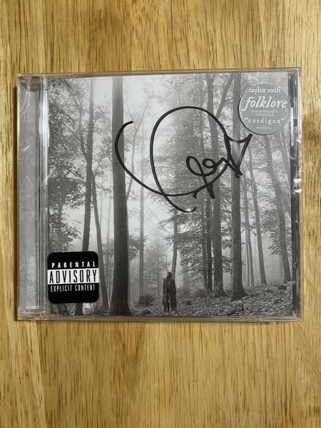 taylor-swift-folklore-signed-autographed-cd-sealed-taylor-swift-s-hair-in-seal